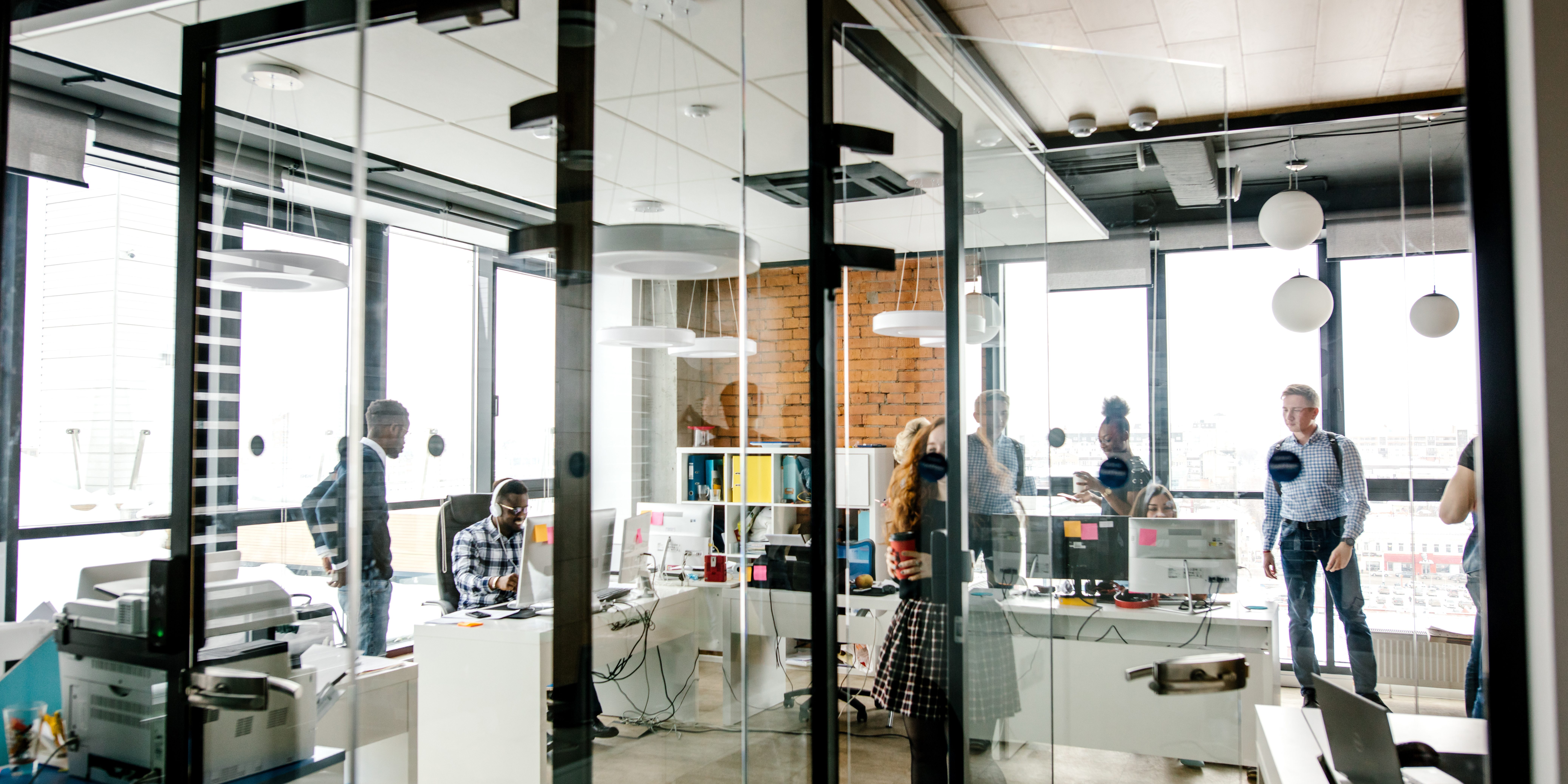 modern bright small office with glass walls, glass door, panorama window Office partitions