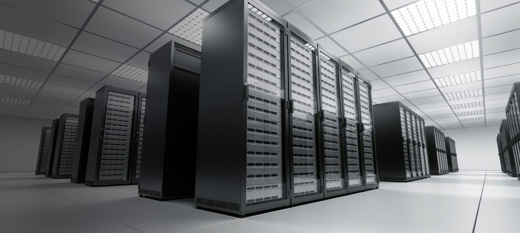 Rows of server racks in a bright data centre hall